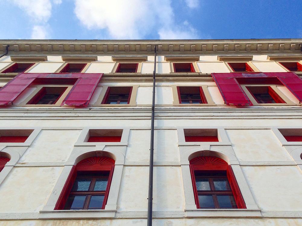 House with reverse Vicenza-style shutters
